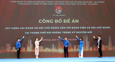 Các đại biểu thực hiện nghi thức công bố Đề án. Ảnh: Hoàng Ngọc - TTXVN