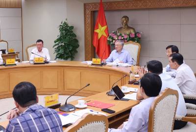 Phó Thủ tướng Thường trực Chính phủ Nguyễn Hòa Bình chủ trì cuộc họp. Ảnh: Văn Điệp - TTXVN