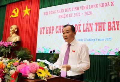 Phó Chủ tịch Thường trực HĐND tỉnh Vĩnh Long Nguyễn Minh Dũng phát biểu ý kiến tại kỳ họp. Ảnh: Phạm Minh Tuấn-TTXVN