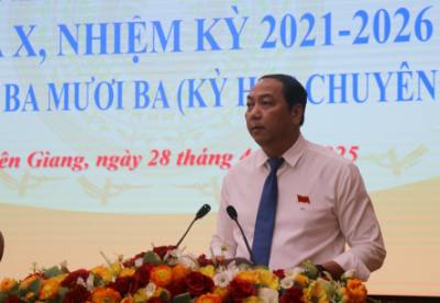 Chủ tịch HĐND tỉnh Kiên Giang Lâm Minh Thành phát biểu tại kỳ họp. Ảnh: Lê Huy Hải - TTXVN