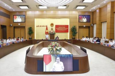 Đồng chí Trần Thanh Mẫn, Bí thư Đảng uỷ Quốc hội, Chủ tịch Quốc hội, Trưởng Tiểu ban Văn kiện phát biểu khai mạc phiên họp. Ảnh: Doãn Tấn – TTXVN