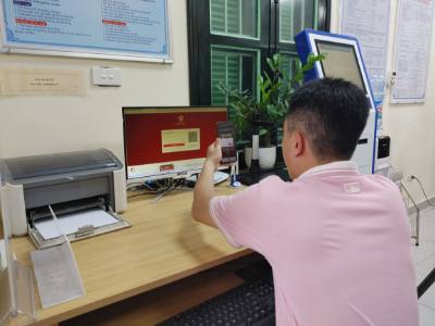 Người dân kỳ vọng sẽ bớt phiền hà khi mô hình chính quyền hai cấp được triển khai. Ảnh: Nguyên Thắng-TTXVN