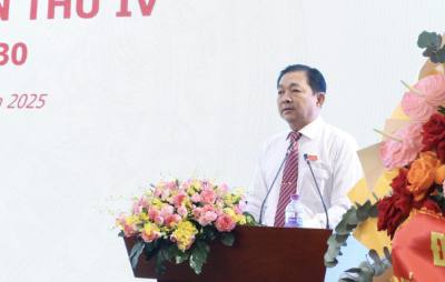Ông Ngô Thanh Vân, Giám đốc Công ty Lương thực Tiền Giang trình bày tham luận tại đại hội. Ảnh: Xuân Anh - TTXVN