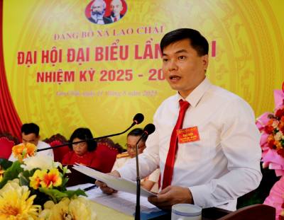 Ông Nông Khánh Toàn, Phó Bí thư Đảng ủy, Chủ tịch UBND xã Lao Chải phát biểu tại Đại hội. Ảnh: Đức Thọ - TTXVN