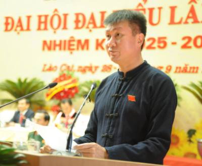 Đồng chí Trần Huy Tuấn, Phó Bí thư Tỉnh ủy Lào Cai, Chủ tịch Ủy ban nhân dân tỉnh phát biểu tại Đại hội. Ảnh: Tuấn Khôi - TTXVN