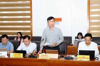 Đại diện Sở Ngoại vụ Lai Châu phát biểu ý kiến tại hội nghị. Ảnh: Nguyễn Oanh-TTXVN.