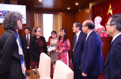 Các đại biểu trao đổi tại hội nghị. Ảnh: Văn Điệp – TTXVN