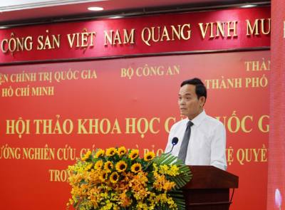 Đồng chí Trần Lưu Quang, Bí thư Trung ương Đảng, Bí thư Thành ủy Thành phố Hồ Chí Minh phát biểu chào mừng hội thảo. Ảnh: Thu Hoài - TTXVN