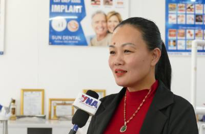 Chị Nguyễn Thị Hảo, Phó Tổng Giám đốc Công ty Thương mại xuất nhập khẩu Thăng Long Global, trả lời phỏng vấn phóng viên TTXVN. Ảnh: Xuân Tú - PV TTXVN tại Lào