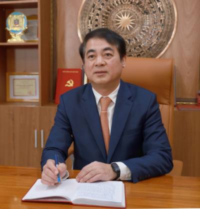 Đồng chí Nghiêm Xuân Thành, Bí thư Tỉnh ủy, Trưởng Đoàn đại biểu Đảng bộ tỉnh Khánh Hòa trả lời phóng viên TTXVN. Ảnh: Xuân Triệu - TTXVN