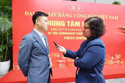 Phóng viên TTXVN tác nghiệp tại đại hội. Ảnh: TTXVN