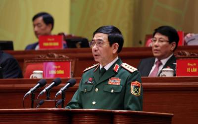 Đại tướng Phan Văn Giang, Ủy viên Bộ Chính trị, Phó Bí thư Quân ủy Trung ương, Bộ trưởng Bộ Quốc phòng, tham luận về vấn đề “Xây dựng Quân đội nhân dân cách mạng, chính quy, tinh nhuệ, hiện đại, làm nòng cốt xây dựng nền quốc phòng vững mạnh, hiện đại, gắn với nền an ninh nhân dân và thế trận lòng dân vững chắc”. Ảnh: TTXVN