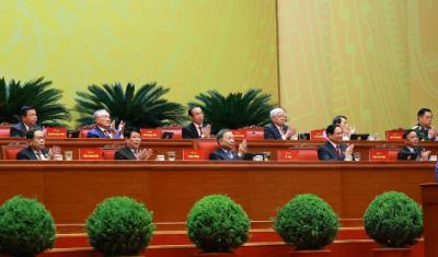 Đoàn Chủ tịch Đại hội tại phiên thảo luận, sáng 21/1. Ảnh: TTXVN
