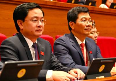 Bí thư Tỉnh ủy Tây Ninh Nguyễn Văn Quyết và Phó Bí thư thường trực tỉnh ủy, Chủ tịch HĐND tỉnh Tây Ninh Nguyễn Mạnh Hùng, dự Đại hội đại biểu toàn quốc lần thứ XIV của Đảng. Ảnh: TTXVN 