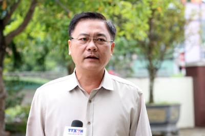 Ông Trần Văn Kính, Bí thư Đảng ủy, Chủ tịch HĐND xã Suối Hiệp (tỉnh Khánh Hòa) trả lời phỏng vấn TTXVN. Ảnh: Đặng Tuấn - TTXVN